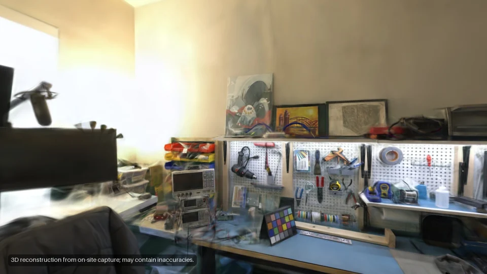 The workshop: a workbench under a pegboard of tools.